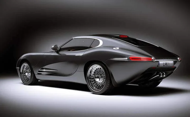 Grey concept coupe shown from the rear three-quarter view with a sweeping roofline